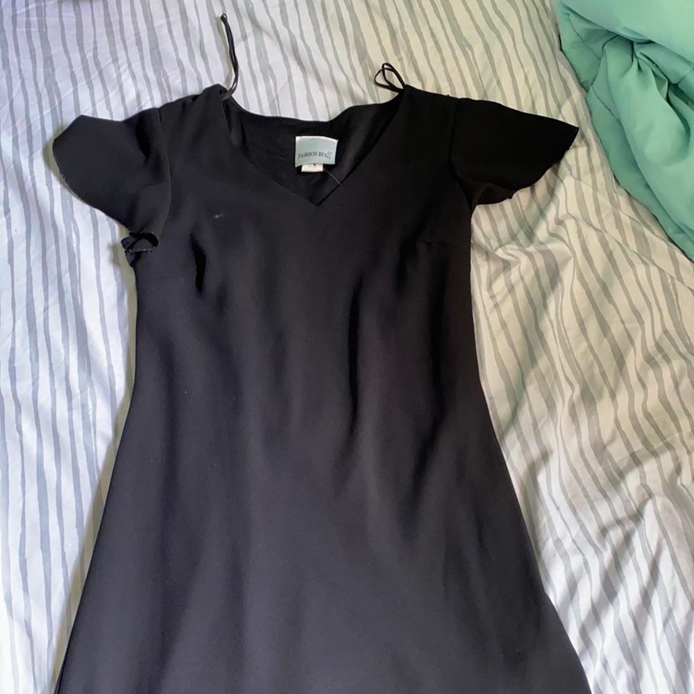 Black mid length dress with shoulder pads